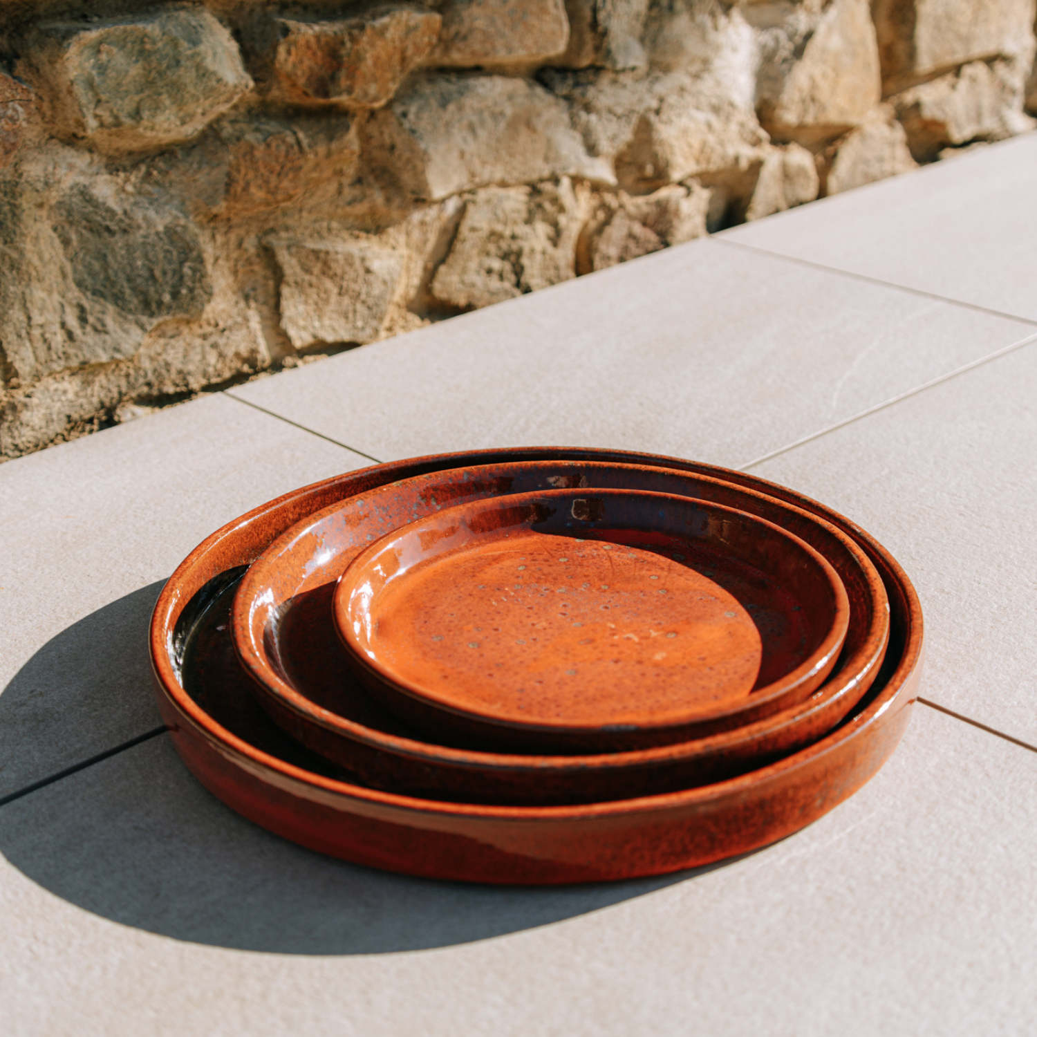 28cm tropical orange saucer handmade in glazed terracotta