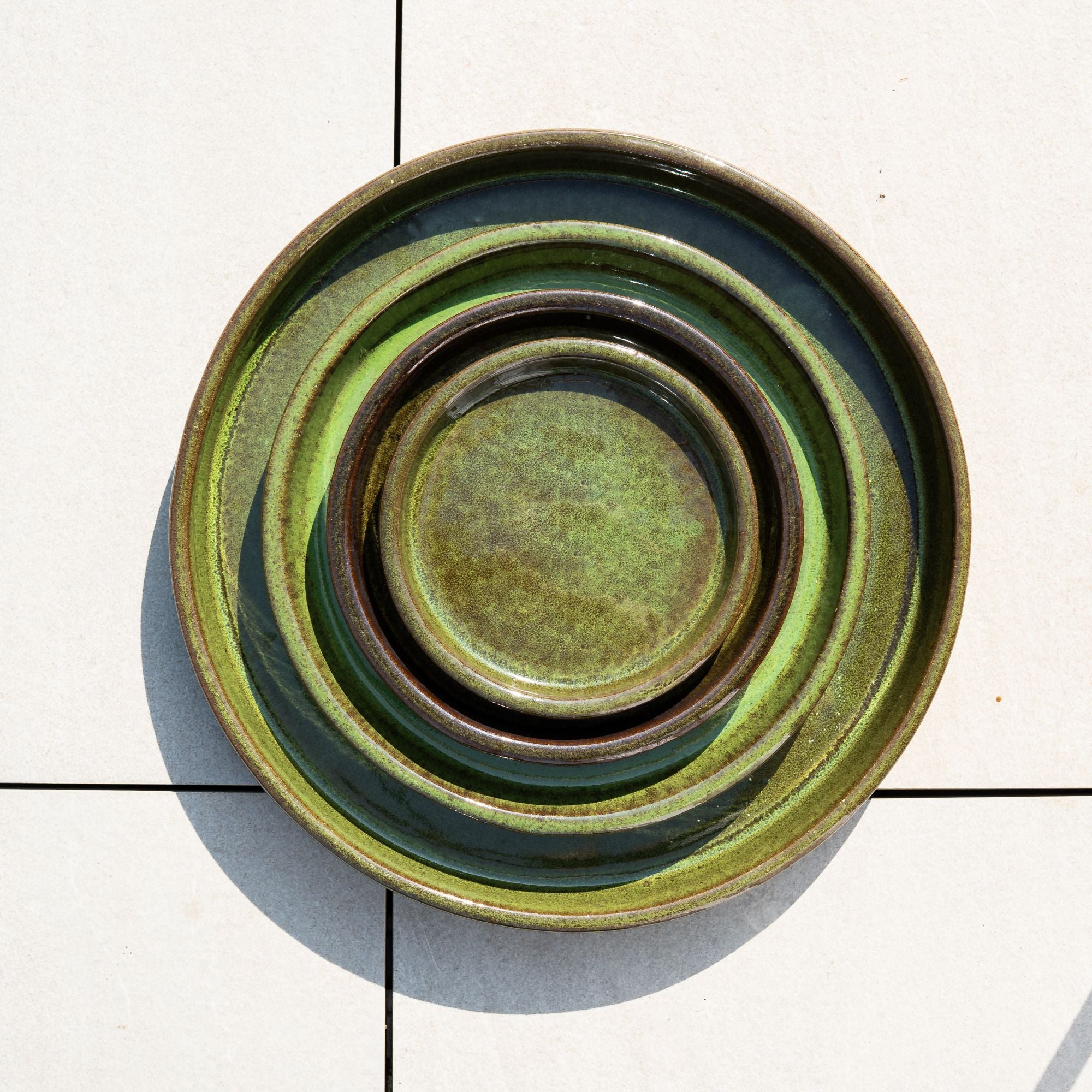 34cm tropical green saucer handmade in glazed terracotta