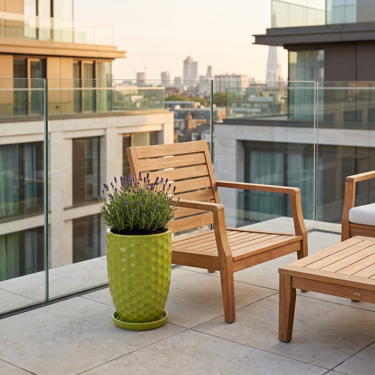 Merovee planter 30x45 cm Olive Green glazed ceramic, with lavender on an urban balcony