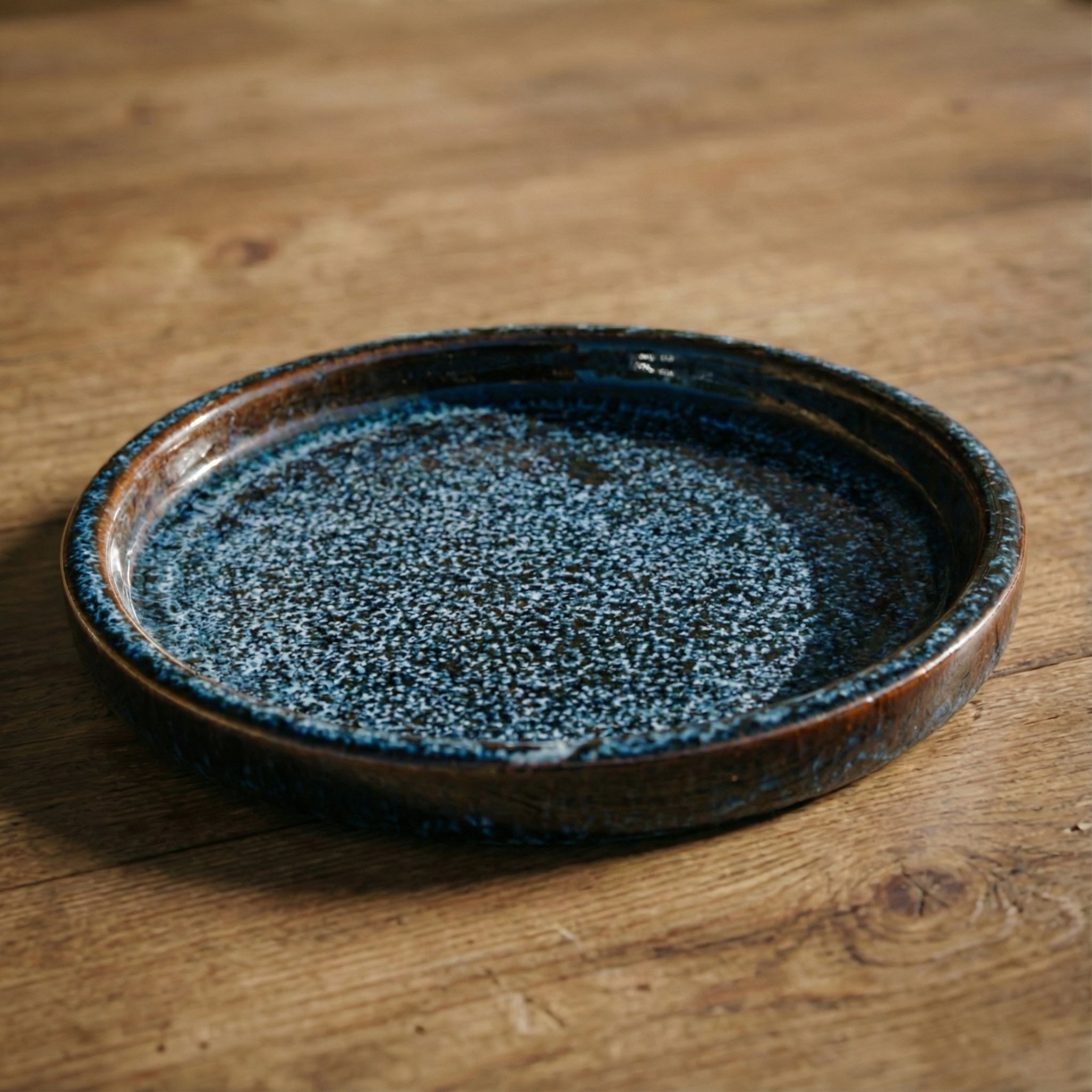 19cm abyss blue saucer handmade in glazed terracotta