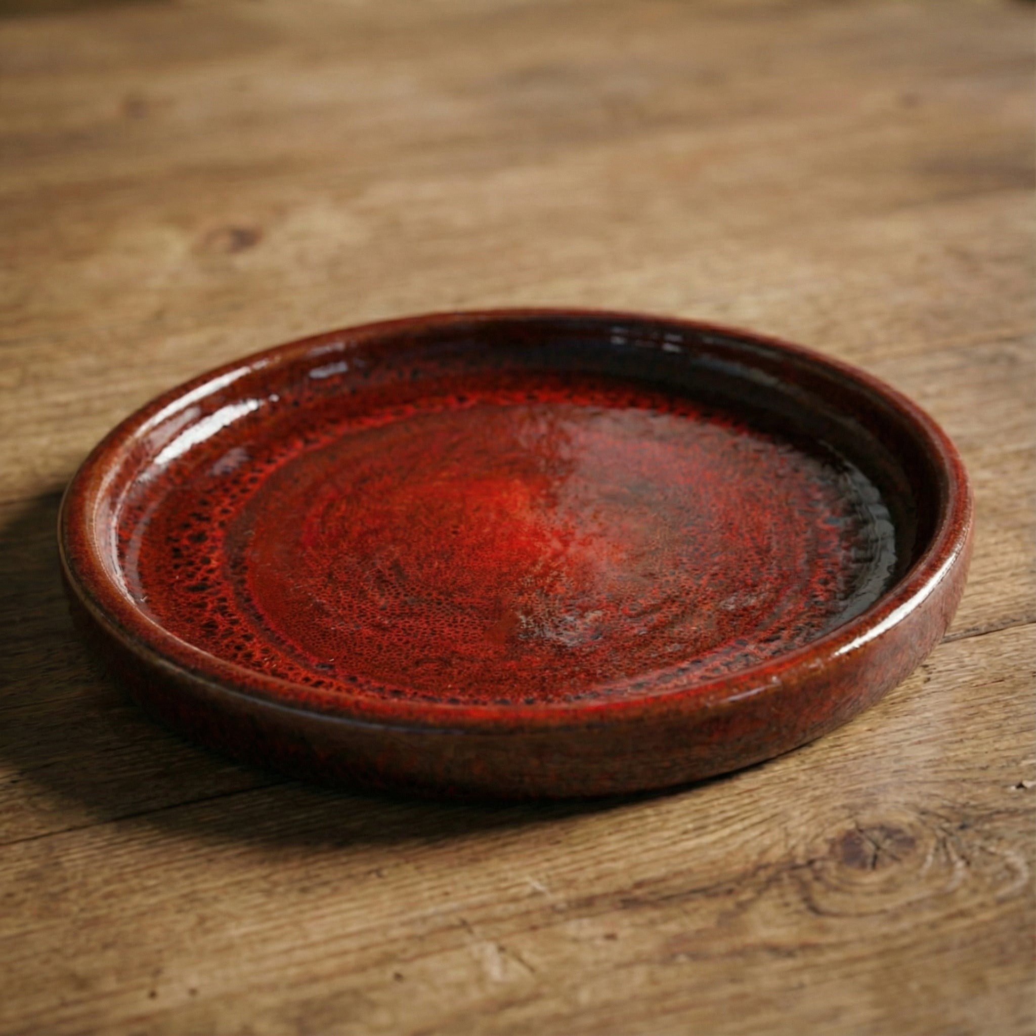 34cm tropical red saucer, handmade in glazed terracotta