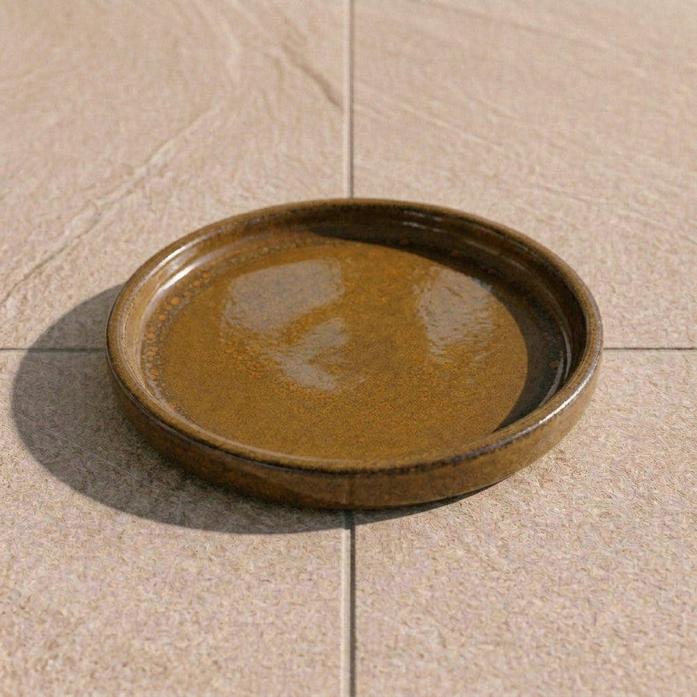 Round saucer 24cm amber honey