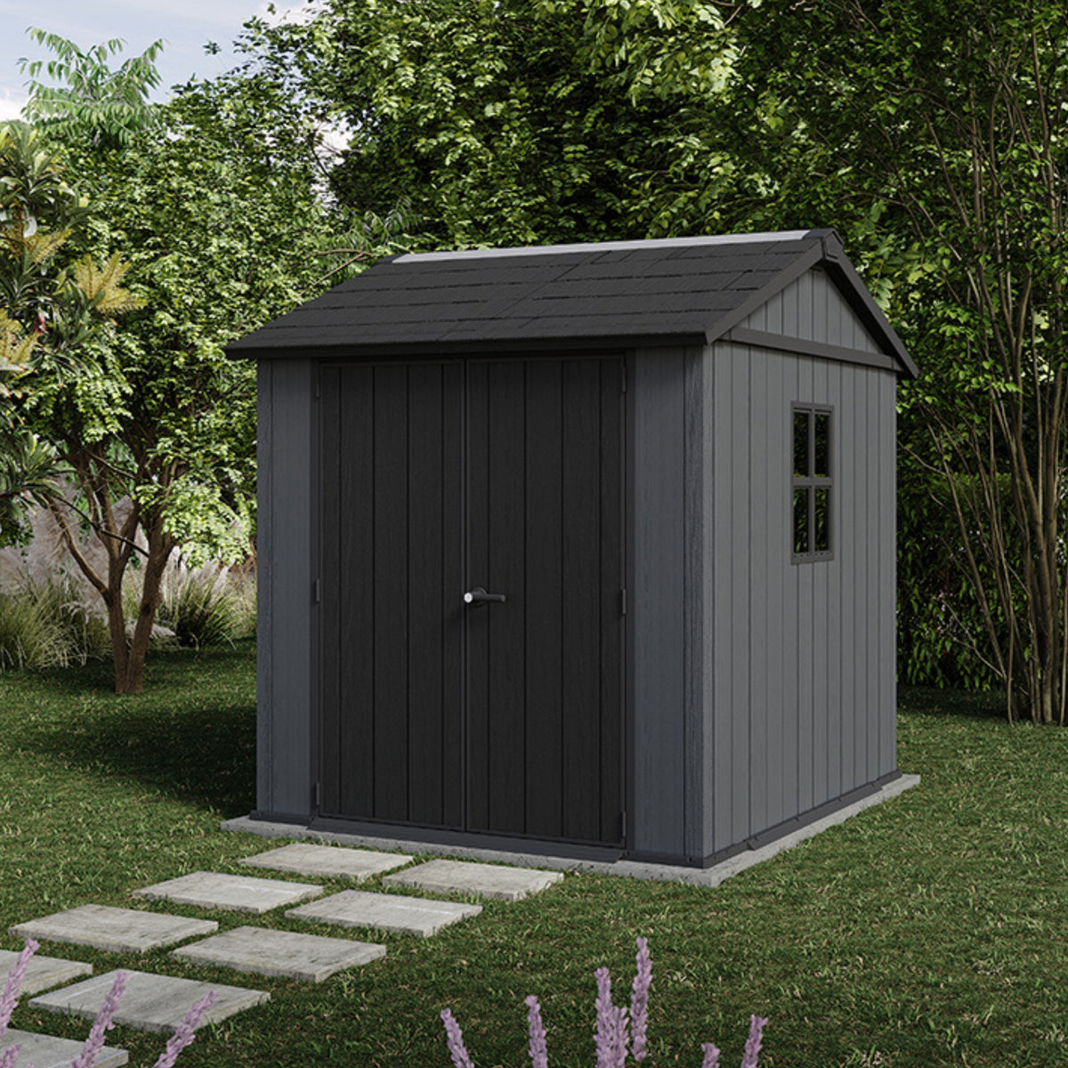 Abri Newton Plus Wide gris dans un jardin, vue en angle avec fenêtre