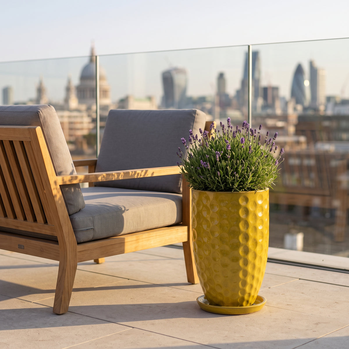 Merovee amphora-shaped planter 30x45 cm Yellow glazed ceramic, planted with lavender on an urban terrace