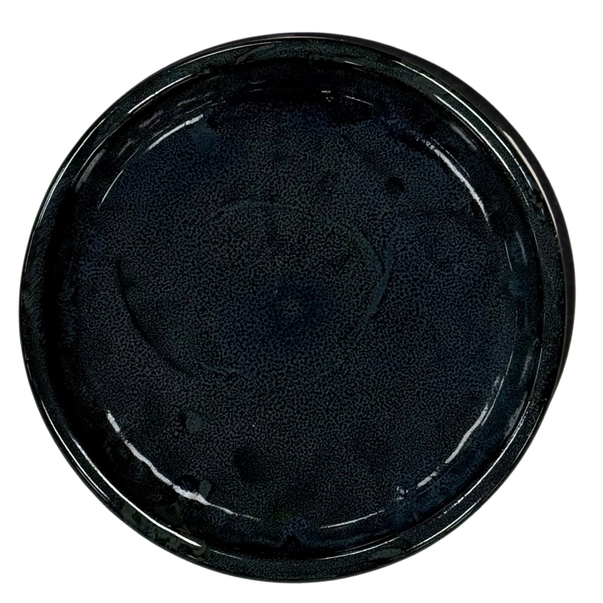 Sapphire saucer, top view on a white background