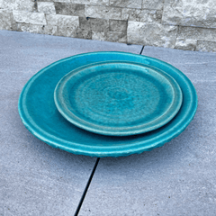 Handmade 25cm turquoise saucer in glazed terracotta