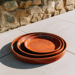 Round saucer 21cm tropical orange, handmade in glazed terracotta