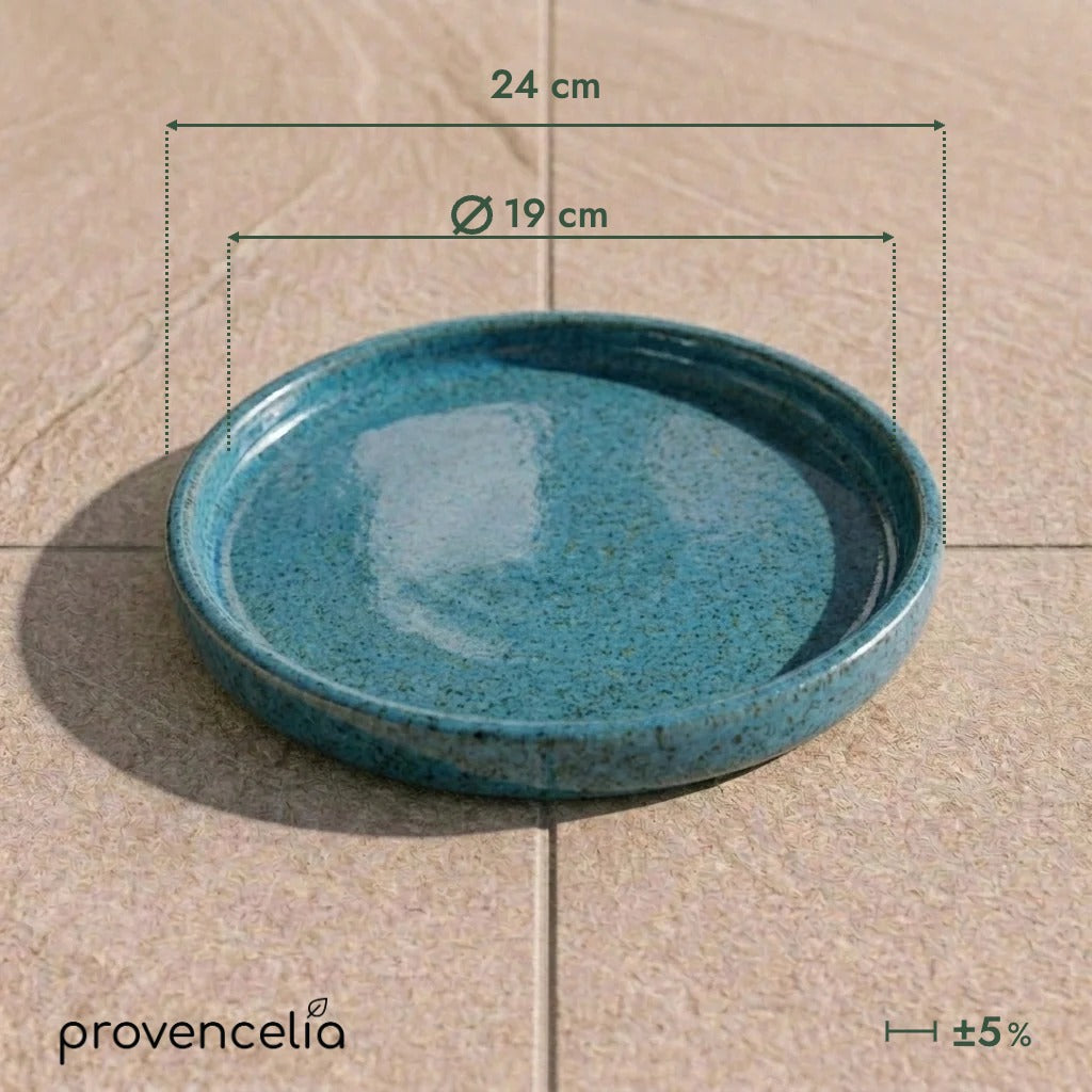Steel Blue saucer 19 cm, top view on tiled flooring