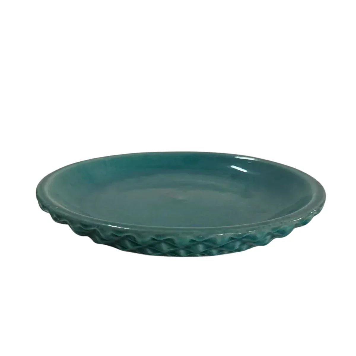 Soucoupe 18 cm turquoise, vue de profil sur fond blanc